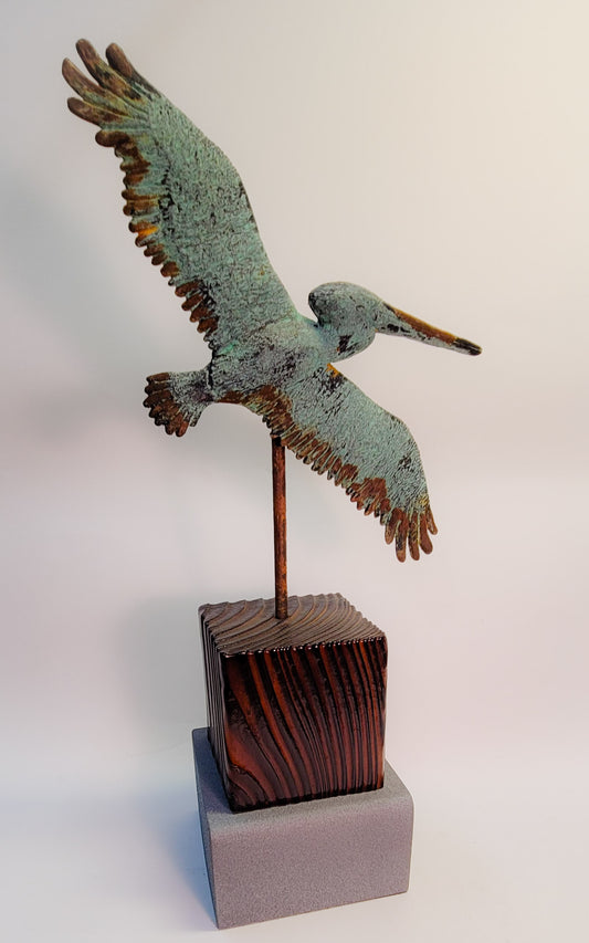 True Locals Rusted Pelican Sculpture by Dave C Reynolds