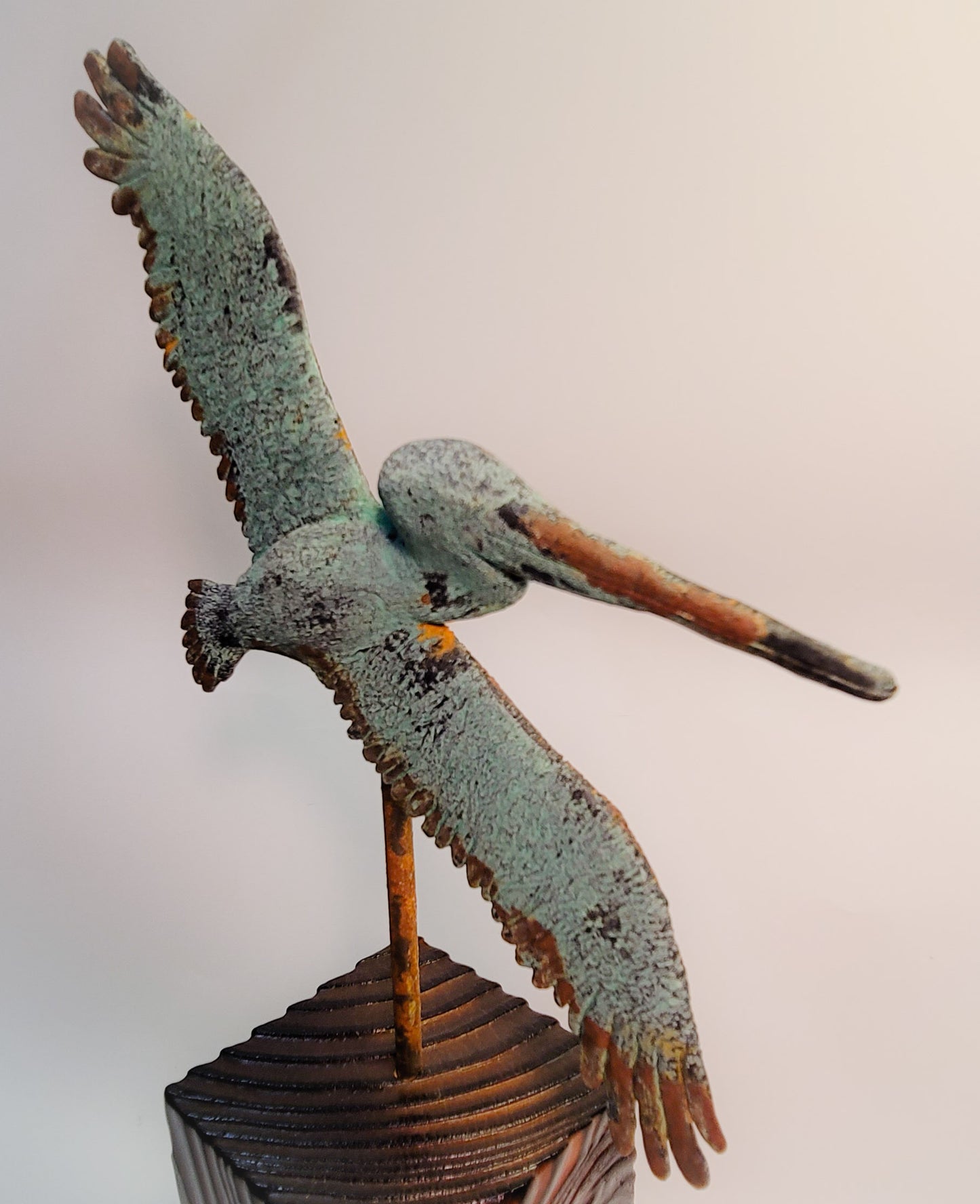 True Locals Rusted Pelican Sculpture by Dave C Reynolds
